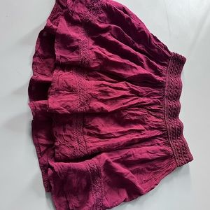 no tag but i wear a AS and it still fits